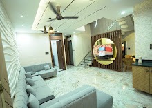 The Sunburst Gold Partition & Wave Wall Living Pavilion