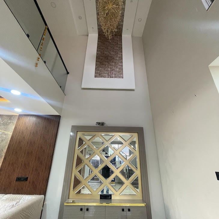 The Double-Height Grand Atrium & Diamond Mirror Salon